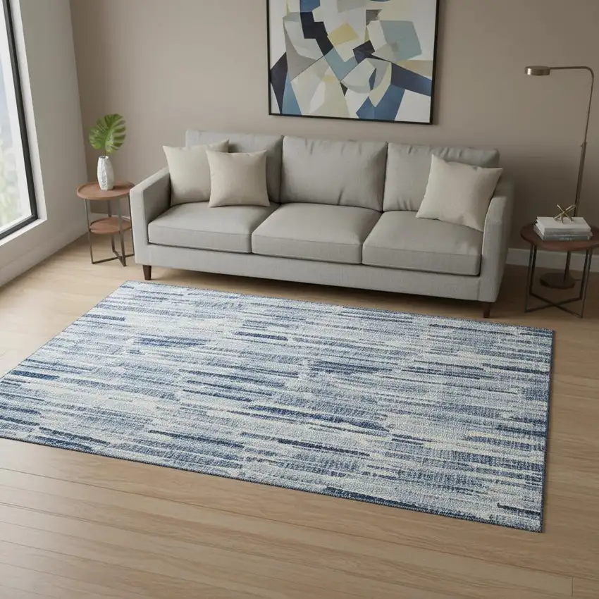 Blue And Ivory Abstract Washable Area Rug With UV Protection Photo 2