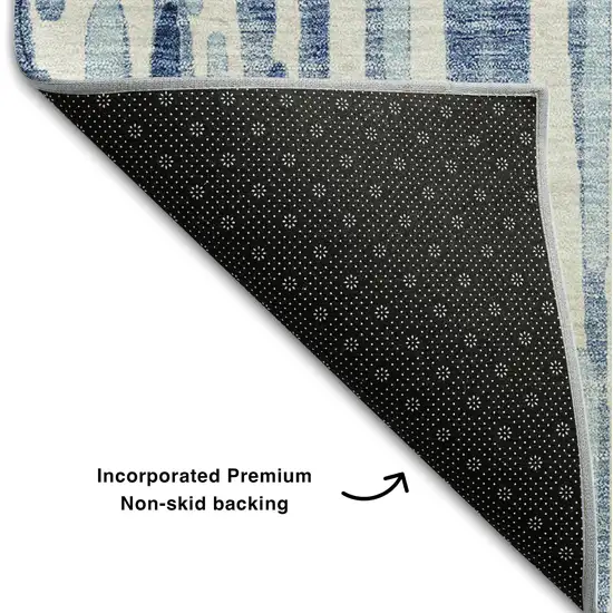 Blue And Ivory Abstract Washable Area Rug With UV Protection Photo 6
