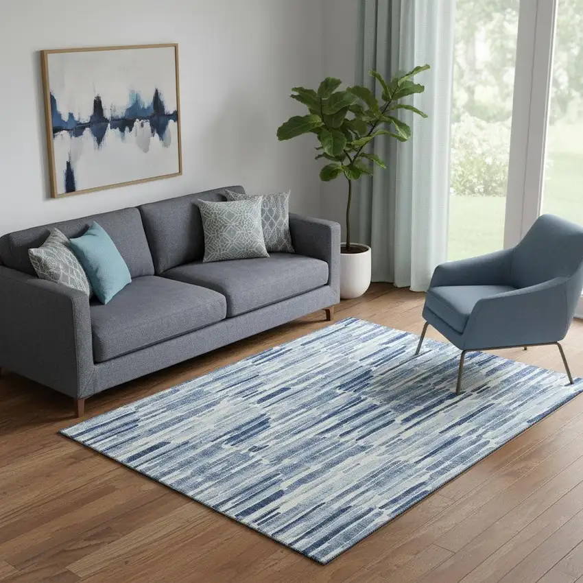 Blue And Ivory Abstract Washable Area Rug With UV Protection Photo 1