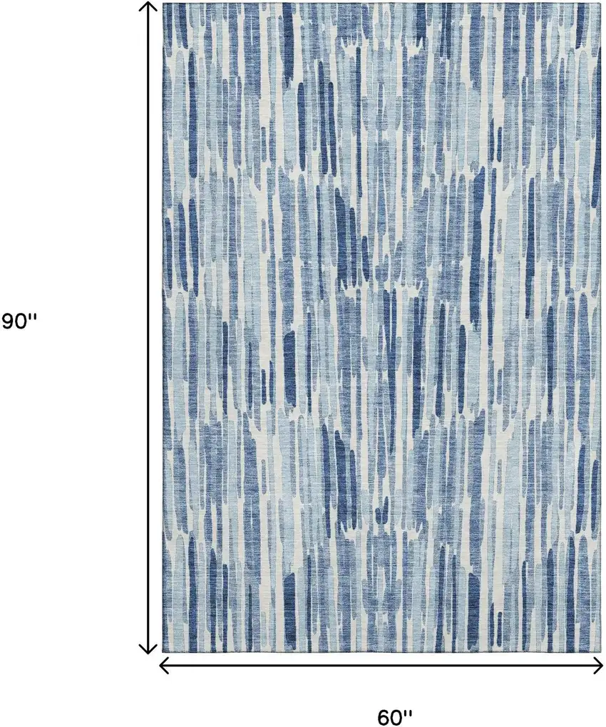 Blue And Ivory Abstract Washable Area Rug With UV Protection Photo 3