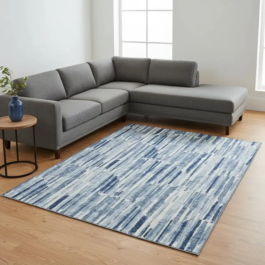 Blue And Ivory Abstract Washable Area Rug With UV Protection Photo 2