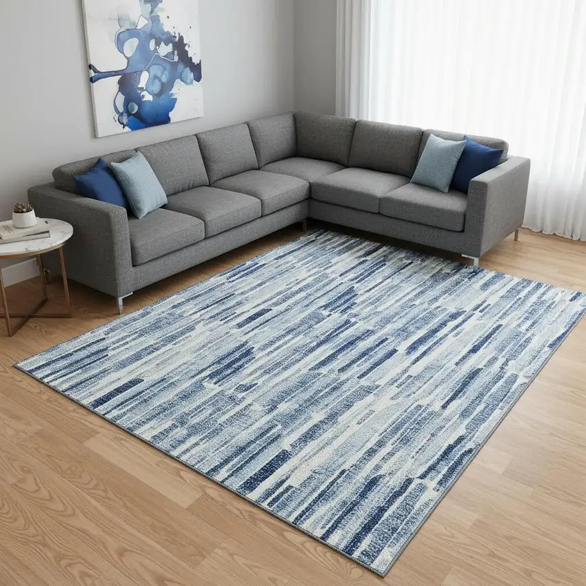 Blue And Ivory Abstract Washable Area Rug With UV Protection Photo 2