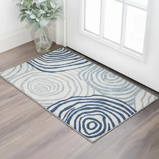 Blue And Ivory Abstract Washable Area Rug With UV Protection Photo 2