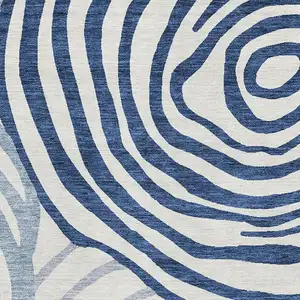 Photo of Blue And Ivory Abstract Washable Area Rug With UV Protection