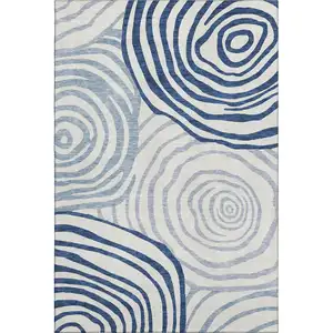 Photo of Blue And Ivory Abstract Washable Area Rug With UV Protection