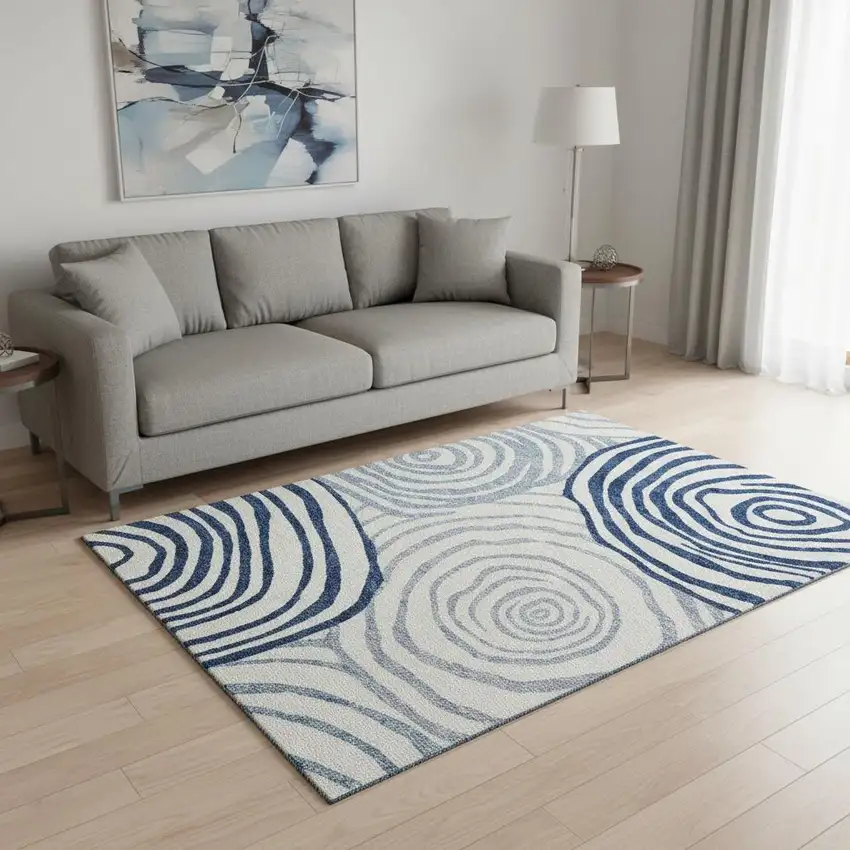 Blue And Ivory Abstract Washable Area Rug With UV Protection Photo 2