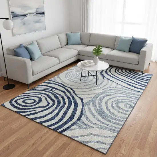 Blue And Ivory Abstract Washable Area Rug With UV Protection Photo 2