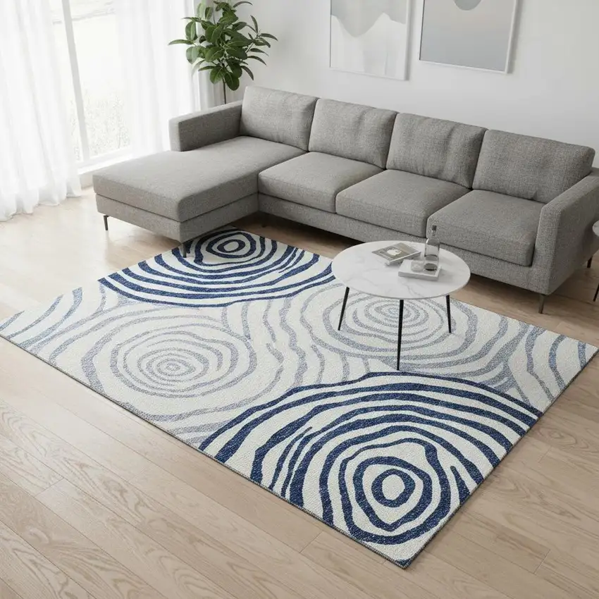 Blue And Ivory Abstract Washable Area Rug With UV Protection Photo 2