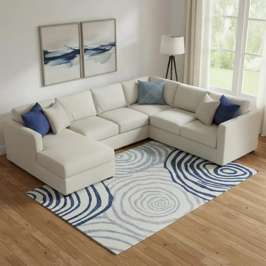Blue And Ivory Abstract Washable Area Rug With UV Protection Photo 1