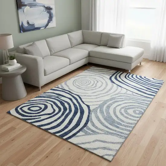 Blue And Ivory Abstract Washable Area Rug With UV Protection Photo 2