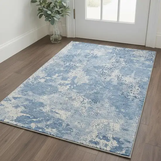 Blue And Ivory Abstract Washable Area Rug With UV Protection Photo 2