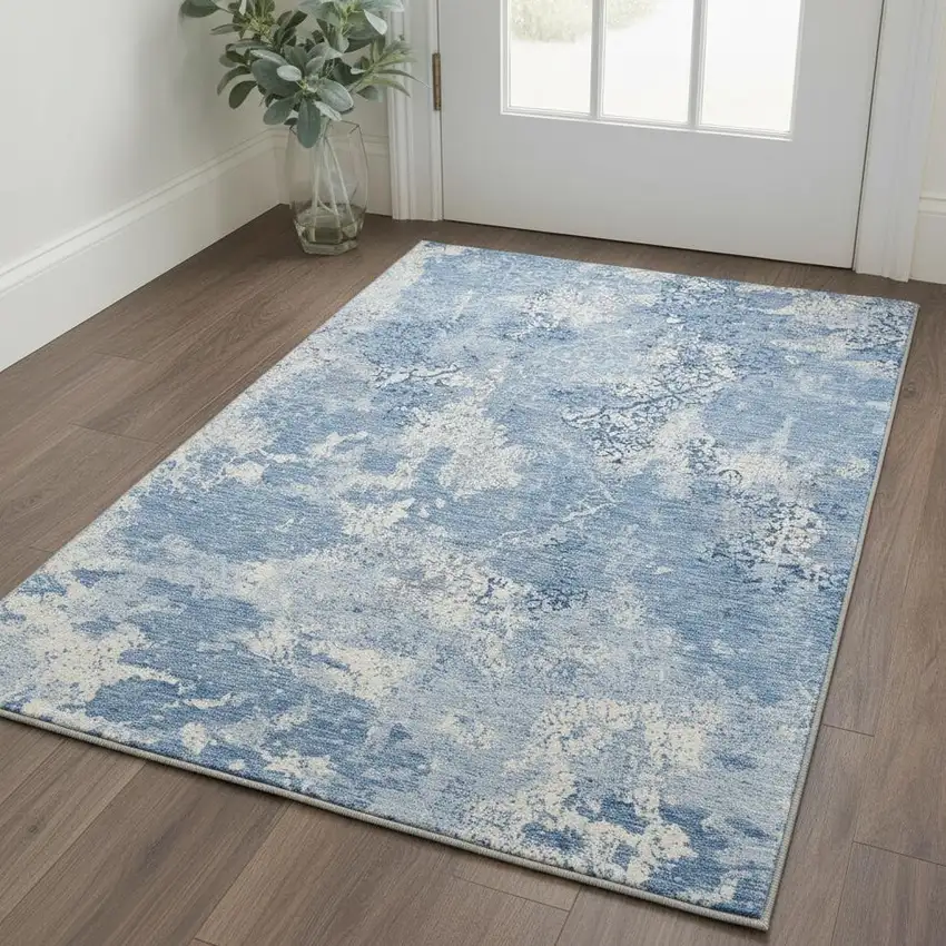 Blue And Ivory Abstract Washable Area Rug With UV Protection Photo 2