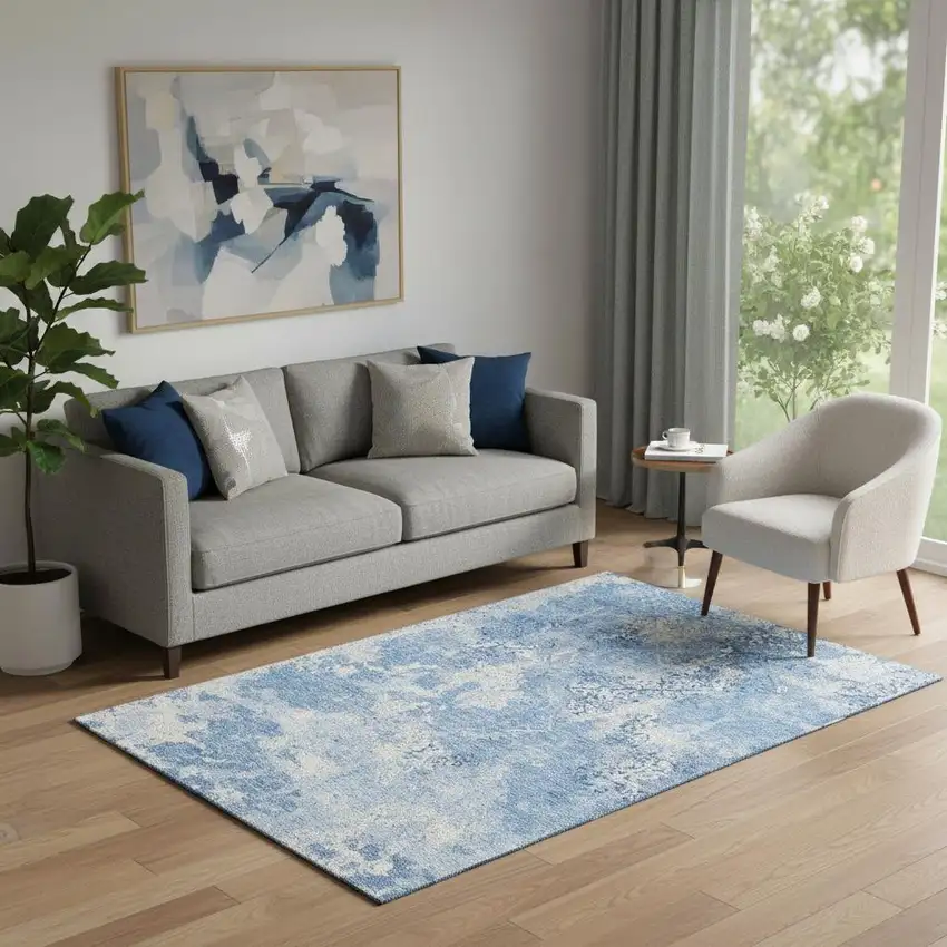Blue And Ivory Abstract Washable Area Rug With UV Protection Photo 1