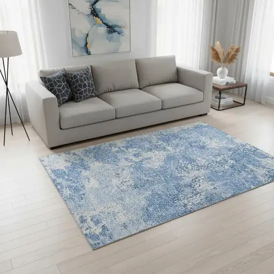 Blue And Ivory Abstract Washable Area Rug With UV Protection Photo 2