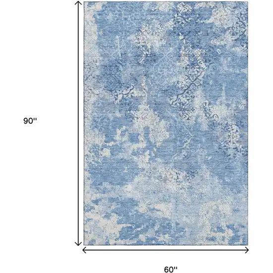 Blue And Ivory Abstract Washable Area Rug With UV Protection Photo 3