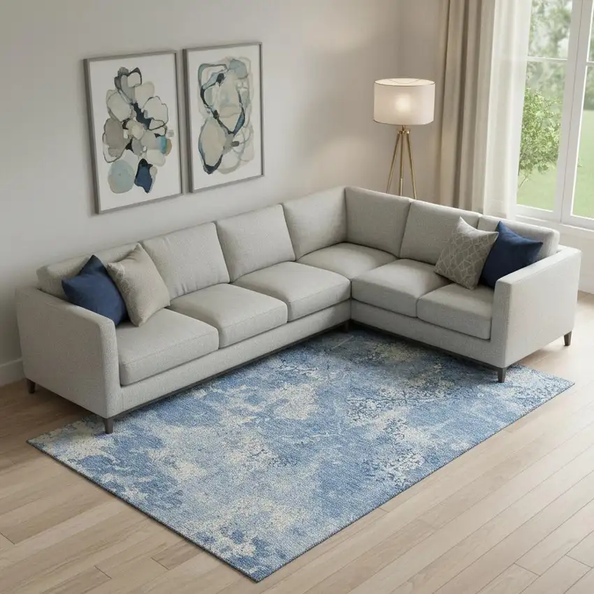 Blue And Ivory Abstract Washable Area Rug With UV Protection Photo 1