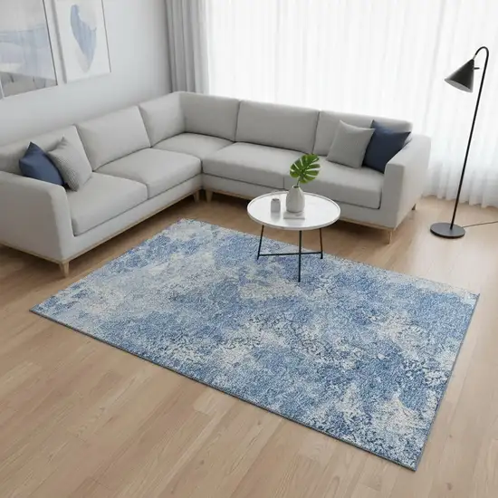 Blue And Ivory Abstract Washable Area Rug With UV Protection Photo 2
