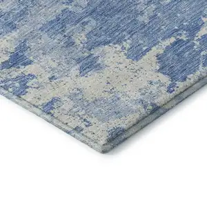 Photo of Blue And Ivory Abstract Washable Area Rug With UV Protection