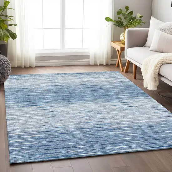 Blue And Ivory Abstract Washable Area Rug With UV Protection Photo 6