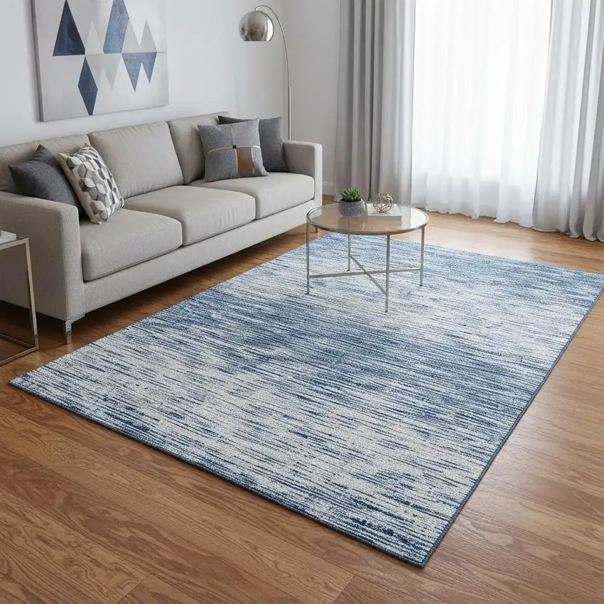 Blue And Ivory Abstract Washable Area Rug With UV Protection Photo 2