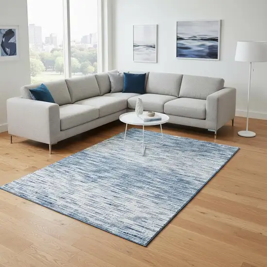 Blue And Ivory Abstract Washable Area Rug With UV Protection Photo 2