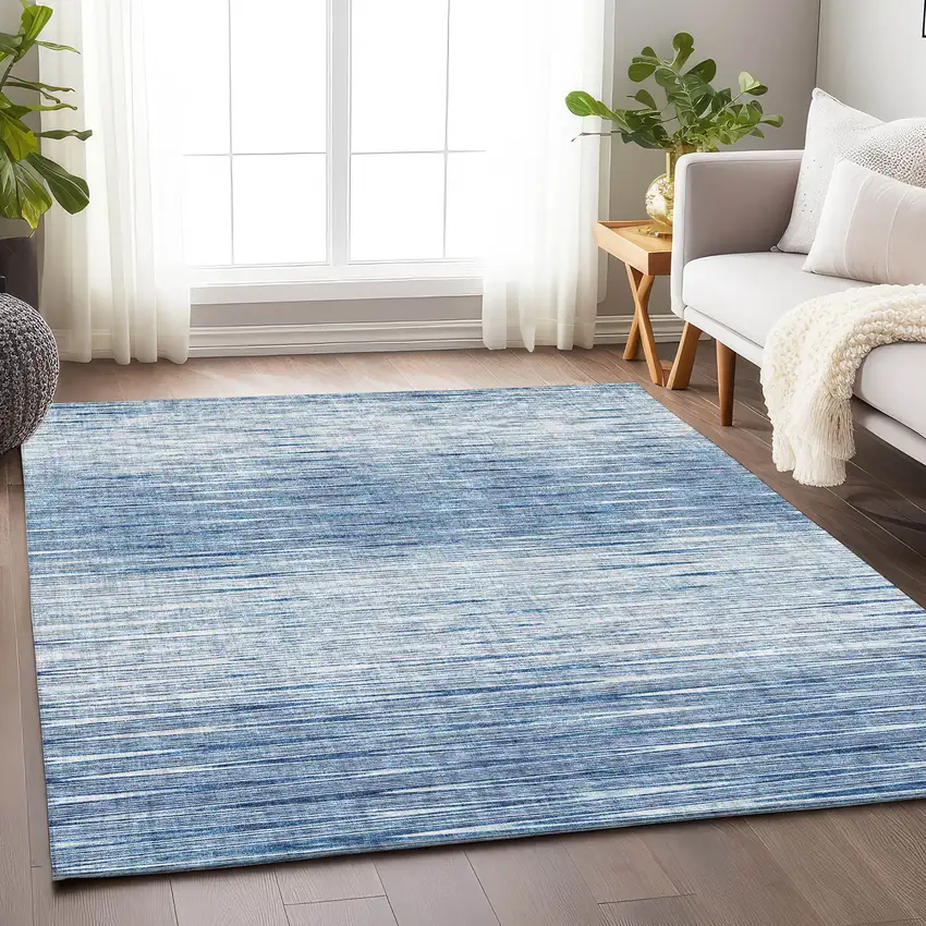 Blue And Ivory Abstract Washable Area Rug With UV Protection Photo 6