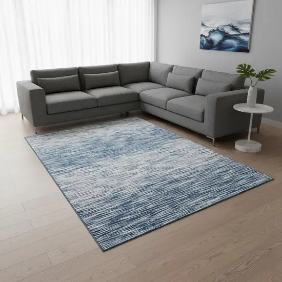 Blue And Ivory Abstract Washable Area Rug With UV Protection Photo 2