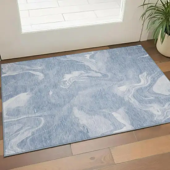 Blue And Ivory Abstract Washable Area Rug With UV Protection Photo 1