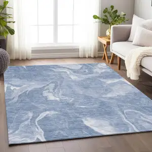 Photo of Blue And Ivory Abstract Washable Area Rug With UV Protection