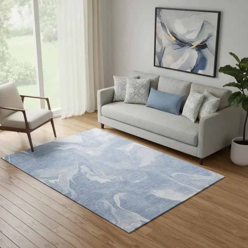 Blue And Ivory Abstract Washable Area Rug With UV Protection Photo 1