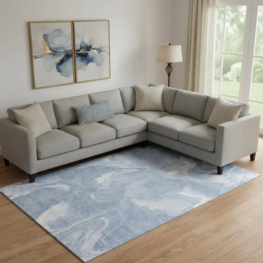 Blue And Ivory Abstract Washable Area Rug With UV Protection Photo 1