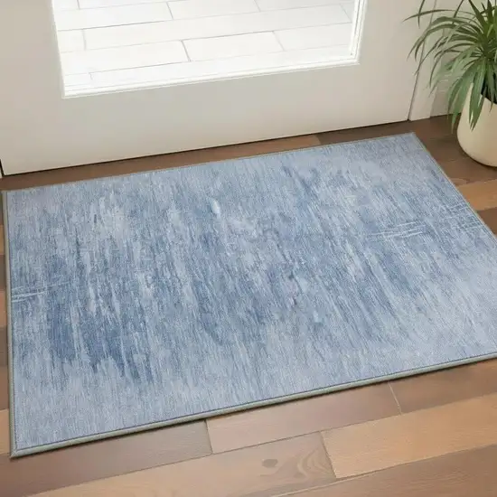 Blue And Ivory Abstract Washable Area Rug With UV Protection Photo 2