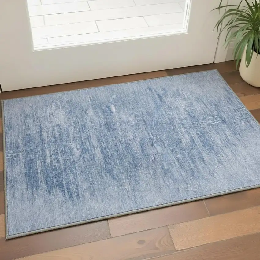 Blue And Ivory Abstract Washable Area Rug With UV Protection Photo 2
