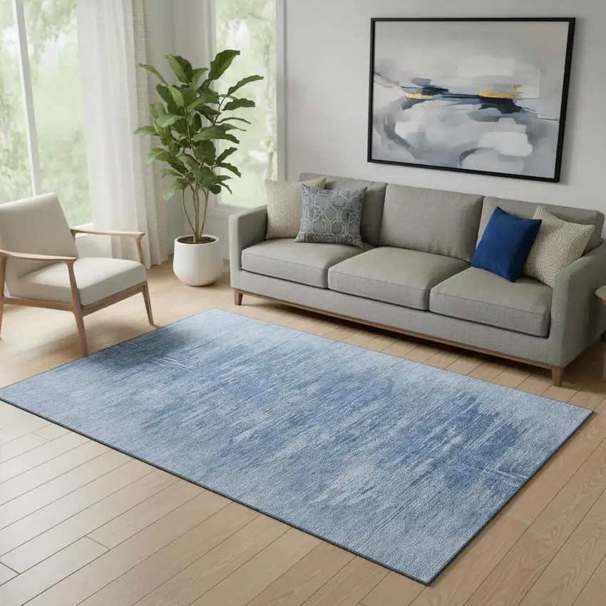 Blue And Ivory Abstract Washable Area Rug With UV Protection Photo 1