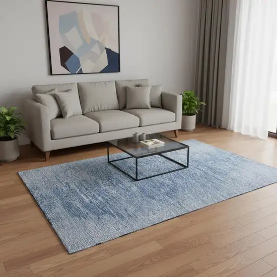 Blue And Ivory Abstract Washable Area Rug With UV Protection Photo 2