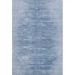 Photo of Blue And Ivory Abstract Washable Area Rug With UV Protection
