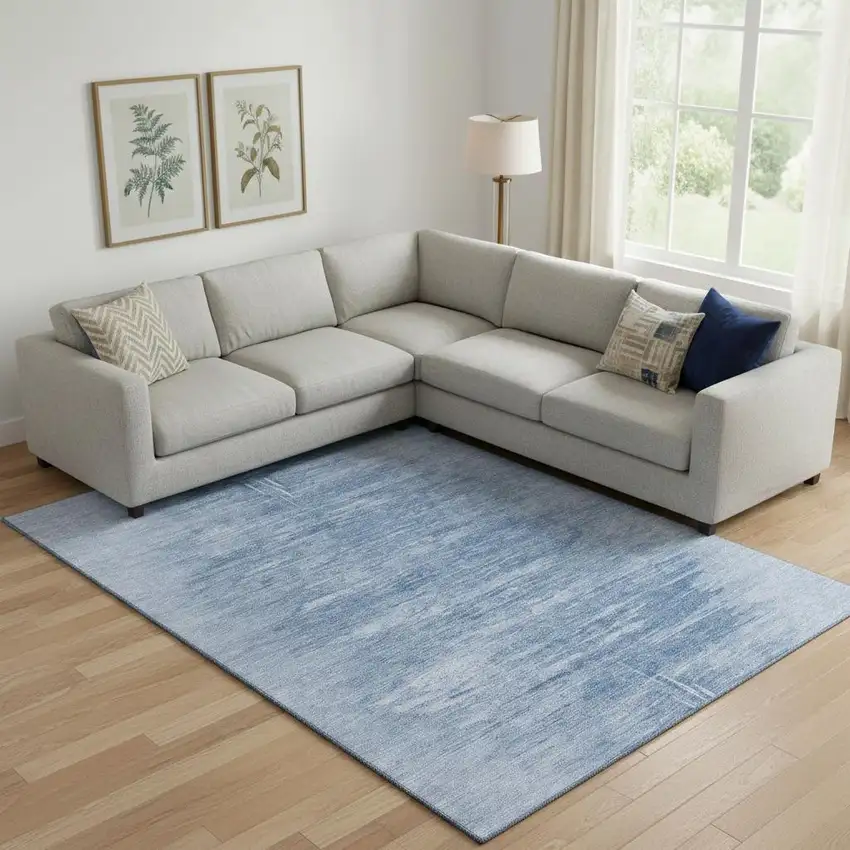 Blue And Ivory Abstract Washable Area Rug With UV Protection Photo 1