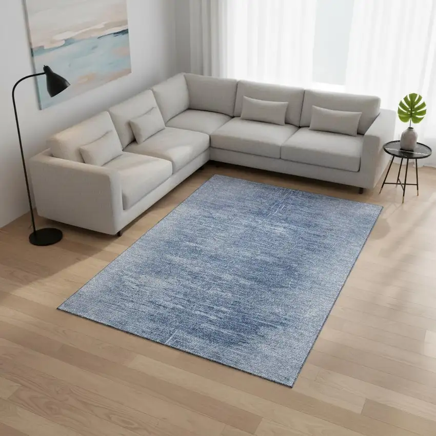 Blue And Ivory Abstract Washable Area Rug With UV Protection Photo 2