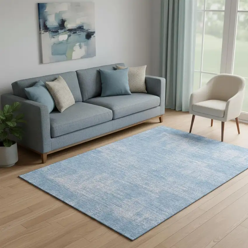 Blue And Ivory Abstract Washable Area Rug With UV Protection Photo 1