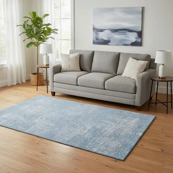 Blue And Ivory Abstract Washable Area Rug With UV Protection Photo 2