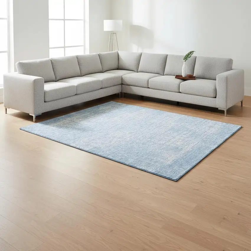 Blue And Ivory Abstract Washable Area Rug With UV Protection Photo 2