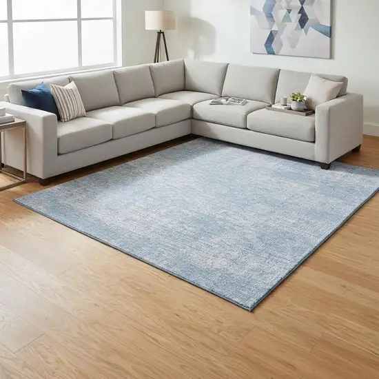 Blue And Ivory Abstract Washable Area Rug With UV Protection Photo 2