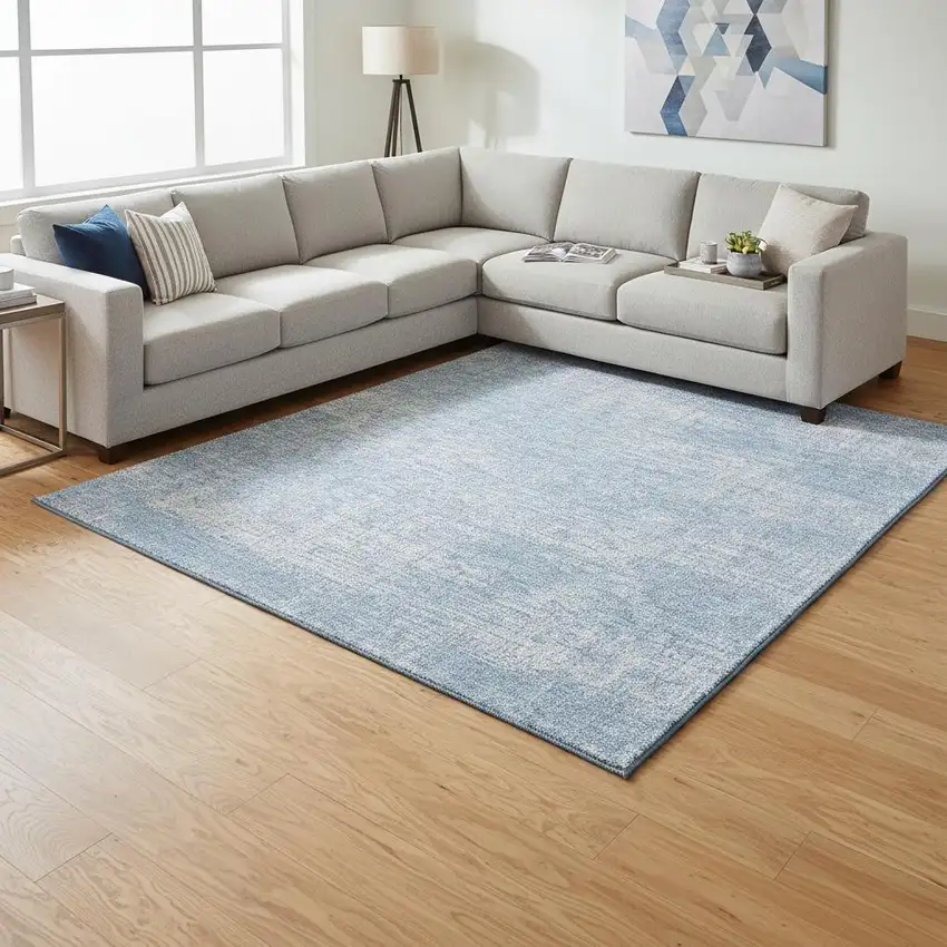 Blue And Ivory Abstract Washable Area Rug With UV Protection Photo 2