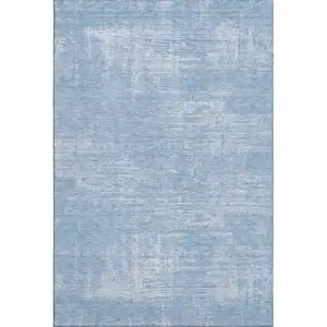 Photo of Blue And Ivory Abstract Washable Area Rug With UV Protection