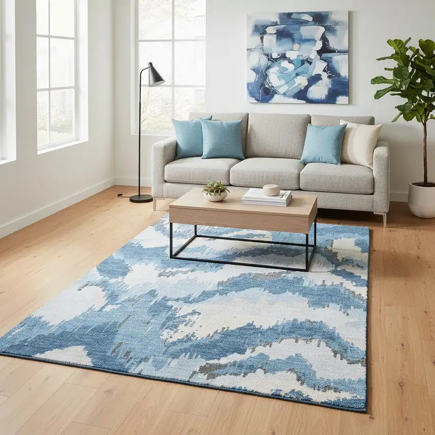 Blue And Ivory Abstract Washable Area Rug With UV Protection Photo 1