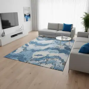 Photo of Blue And Ivory Abstract Washable Area Rug With UV Protection