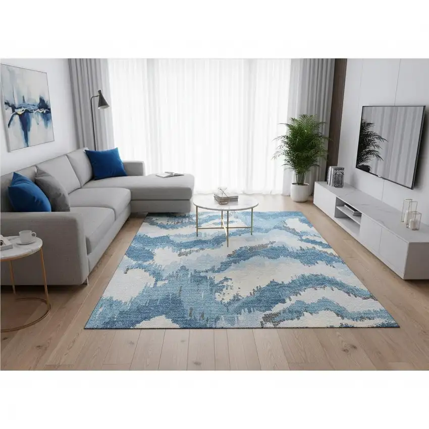 Blue And Ivory Abstract Washable Area Rug With UV Protection Photo 1