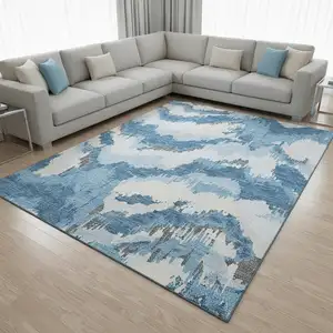 Photo of Blue And Ivory Abstract Washable Area Rug With UV Protection