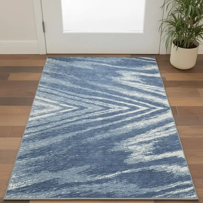 Blue And Ivory Abstract Washable Area Rug With UV Protection Photo 2