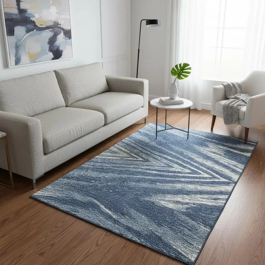 Blue And Ivory Abstract Washable Area Rug With UV Protection Photo 2